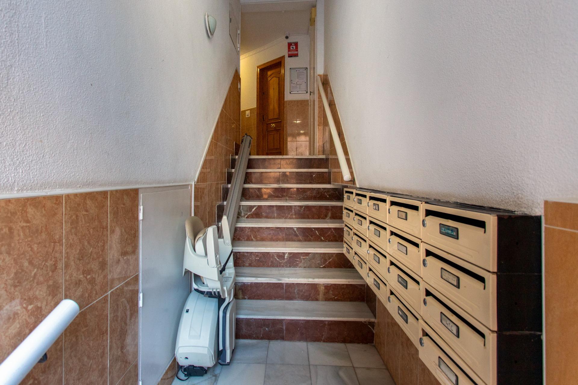 Building staircase with lift access in residential block, Playa del Cura, Torrevieja