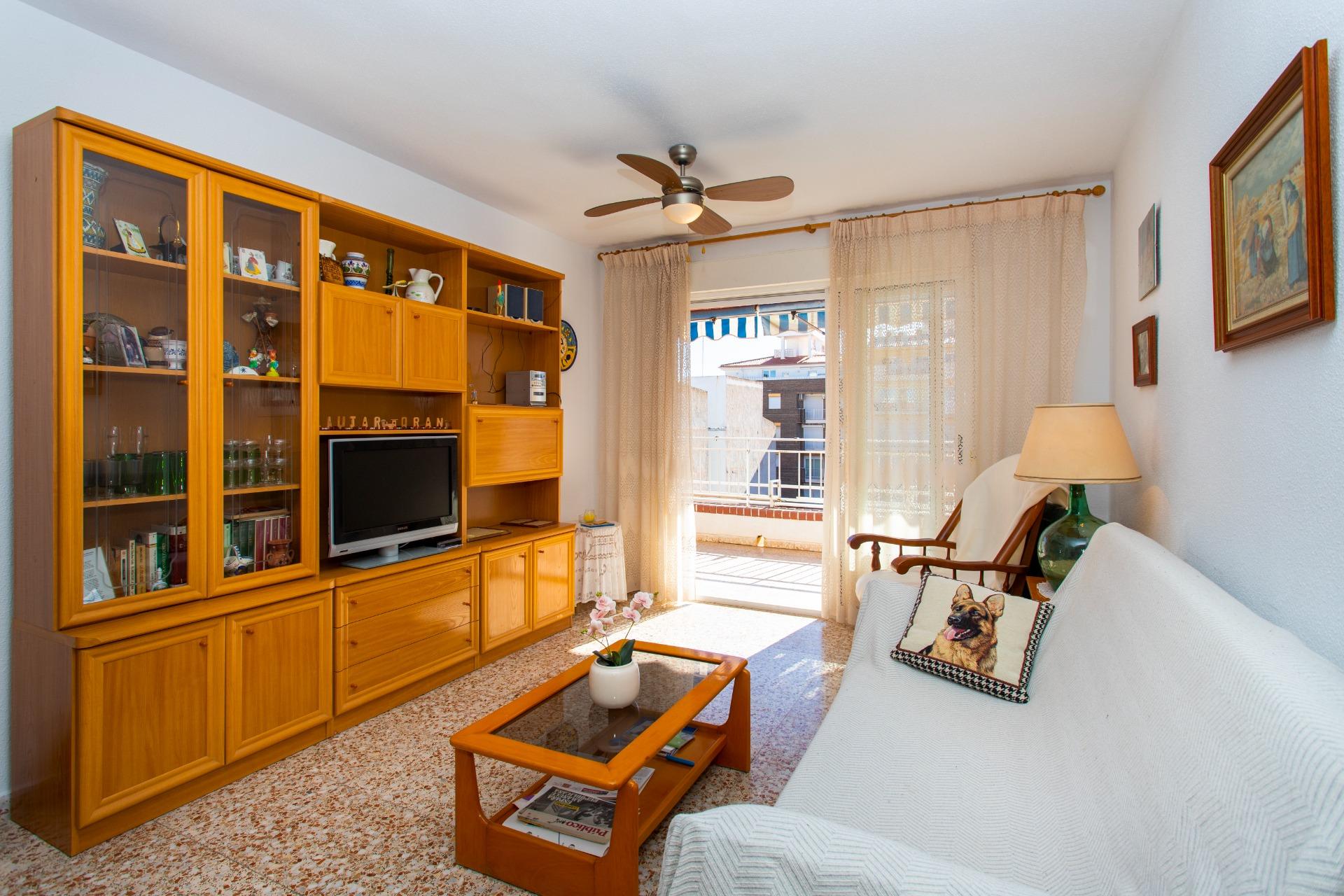 Living room showing glazed door leading to terrace in penthouse, Playa del Cura, Torrevieja