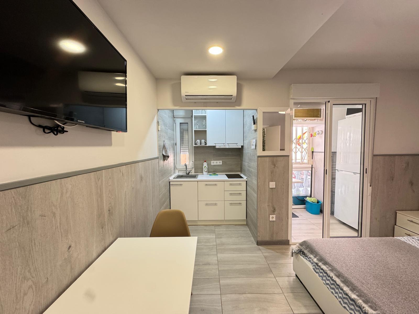 Wall-mounted air conditioning unit in bedroom, 2-bedroom apartment, Playa del Cura