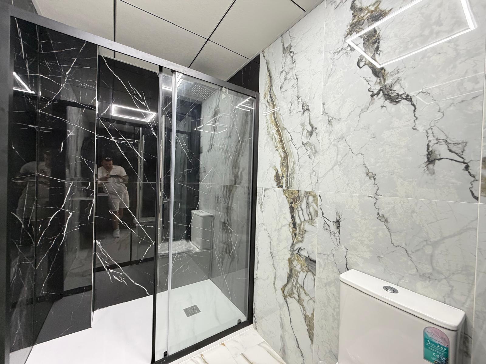 Bathroom wall tiling in renovated apartment, La Zenia