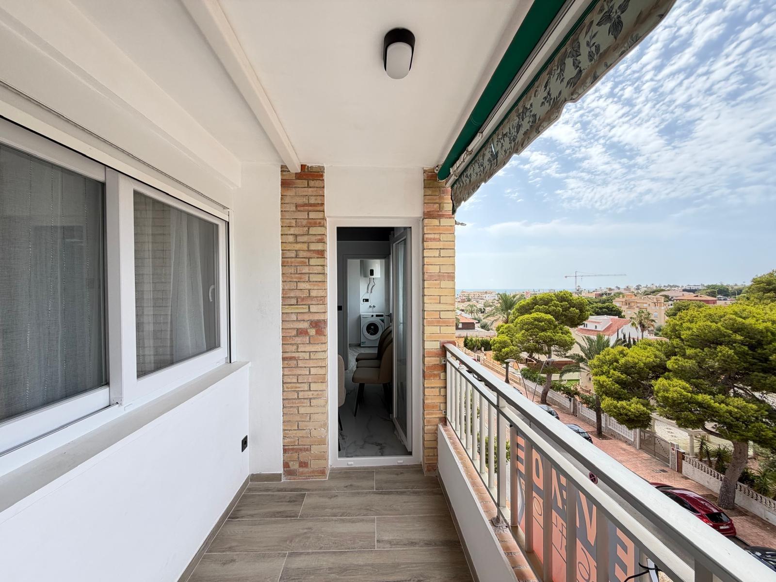Ceiling with tensioned finish and recessed lighting, La Zenia apartment