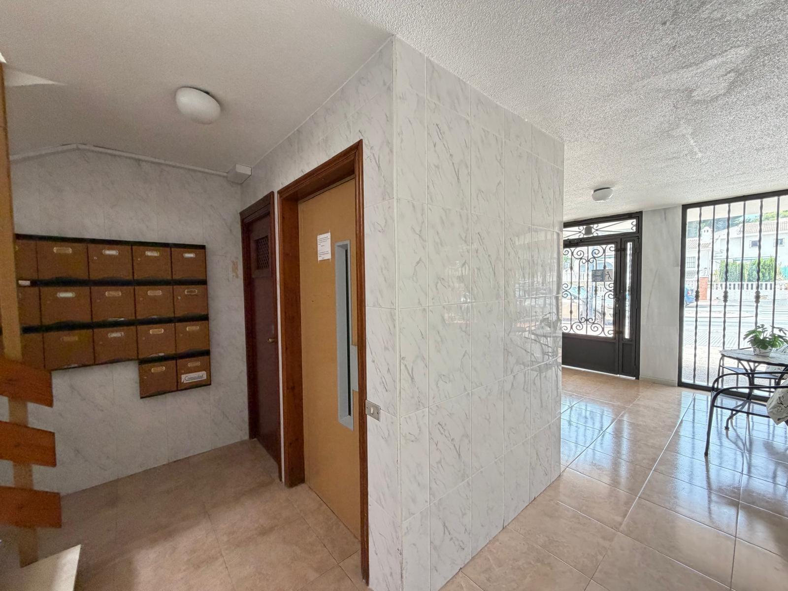 View along terrace of 4th-floor apartment, La Zenia