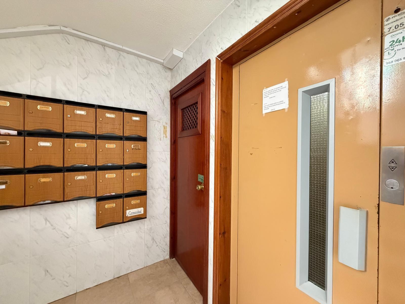 Entrance lobby of apartment building in La Zenia, Orihuela Costa