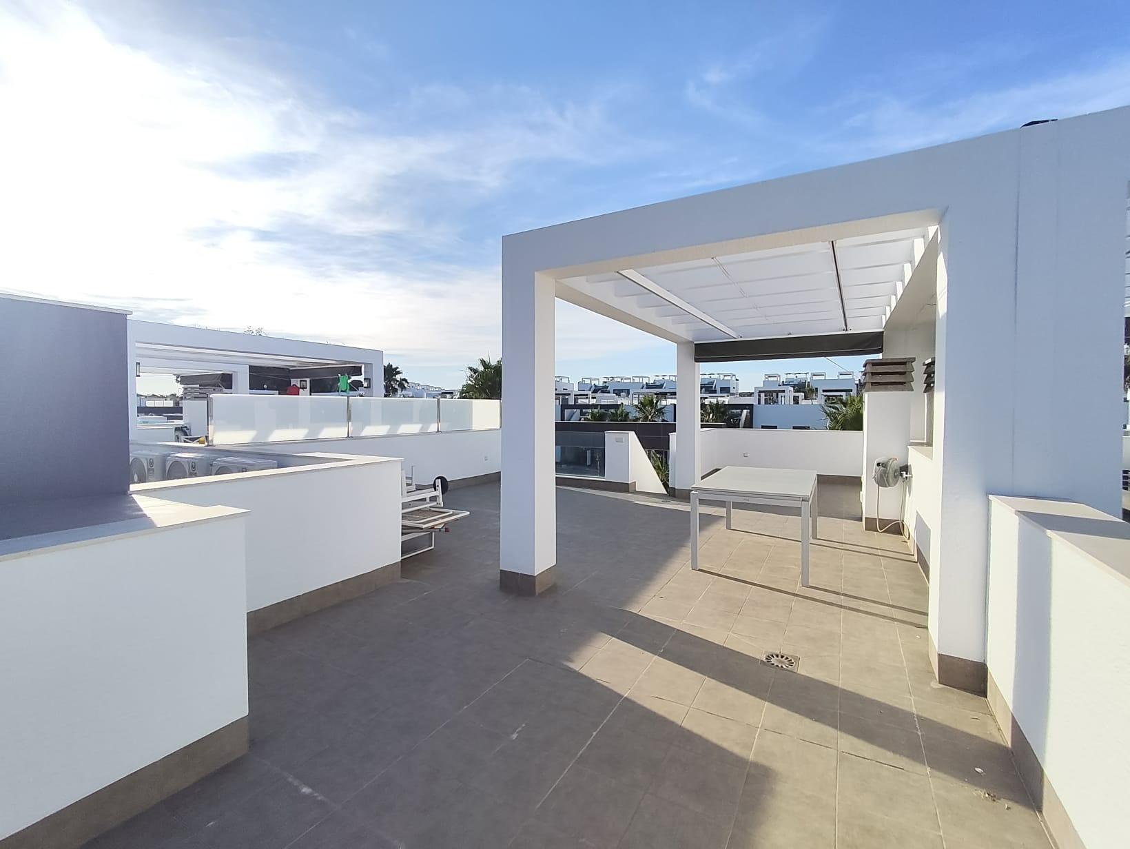 Elevated exterior view of residential buildings in gated complex, El Raso, Guardamar Del Segura