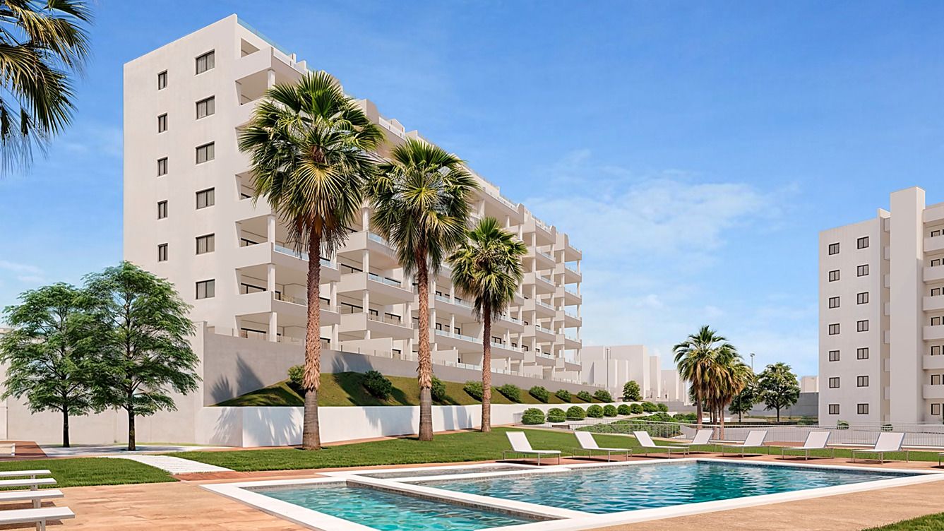 Open-plan kitchen and dining area with fitted appliances in new-build apartment, Pueblo, San Miguel de Salinas