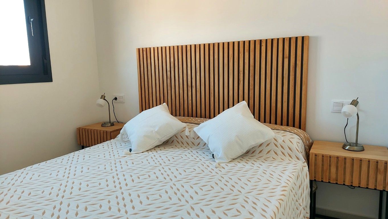 Balcony railing and outdoor space on first-floor apartment, San Miguel de Salinas