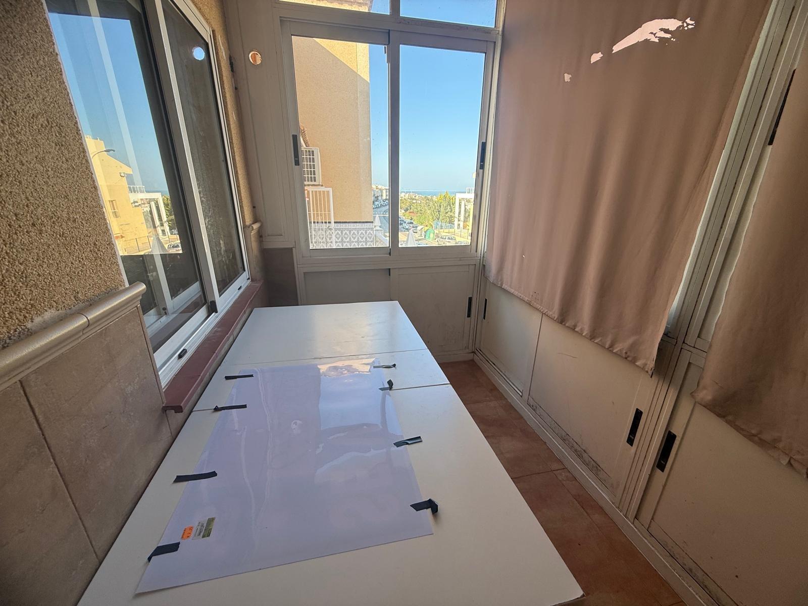 Living and dining room with fireplace in 1-bedroom townhouse, Torreblanca, Torrevieja