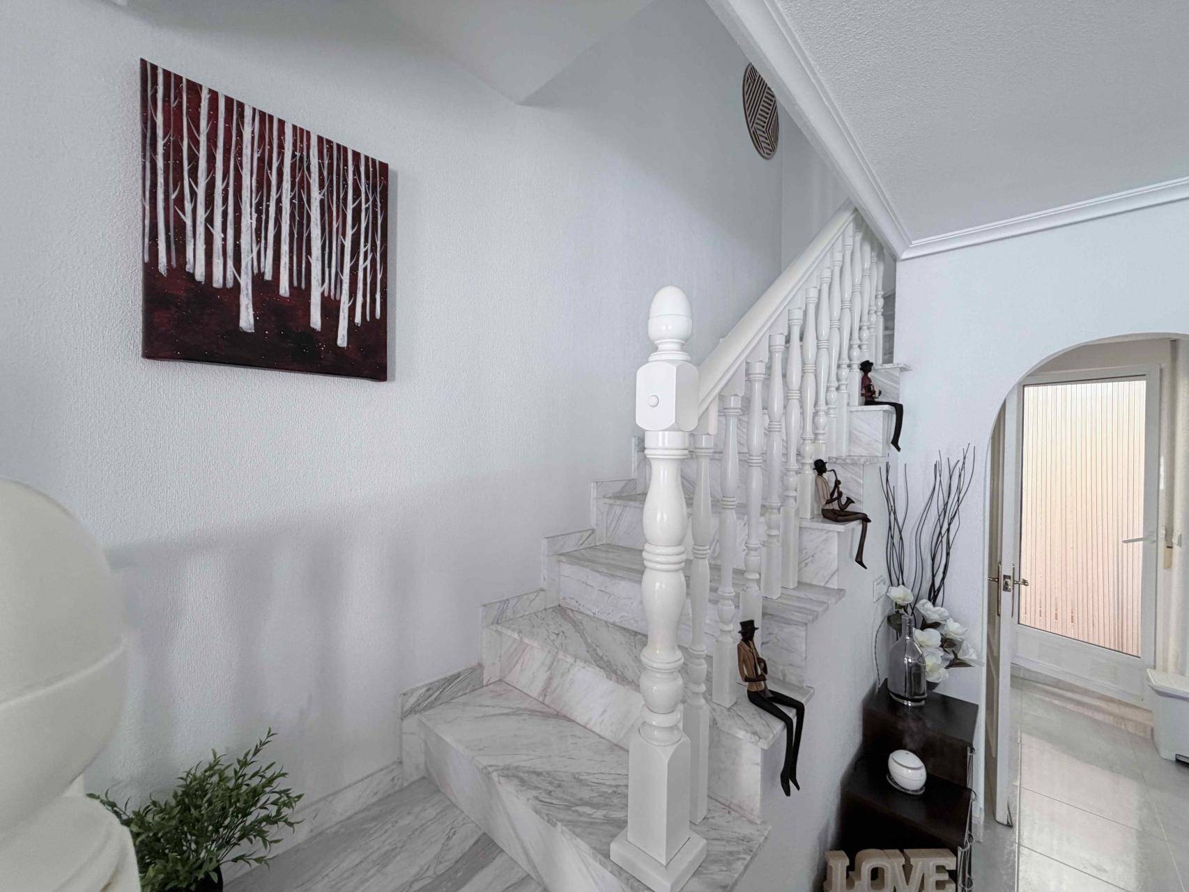 Interior staircase leading to upper floor in 3-bedroom villa, Los Almendros-La Florida