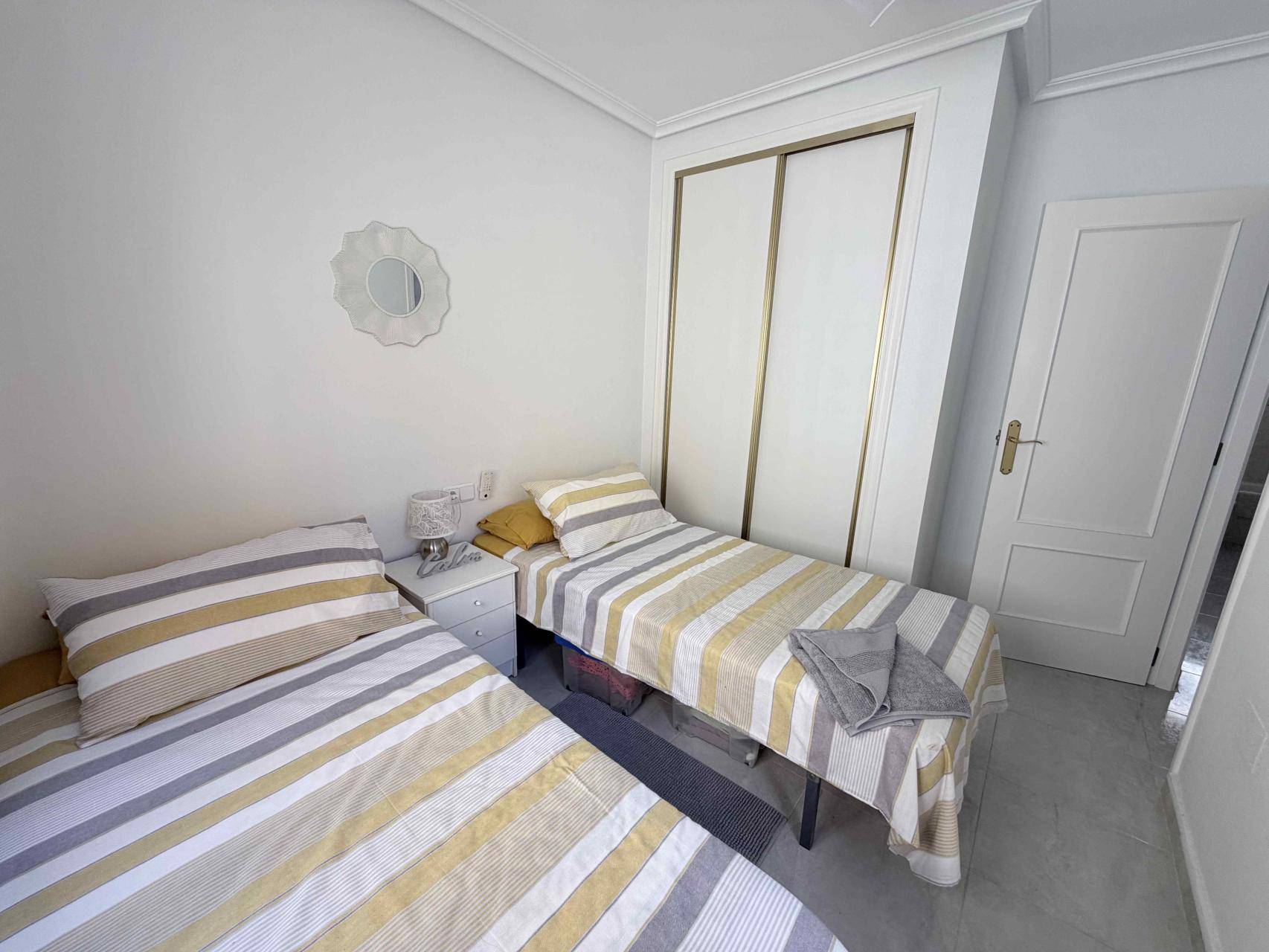 Bedroom with window and storage in villa, Los Almendros-La Florida