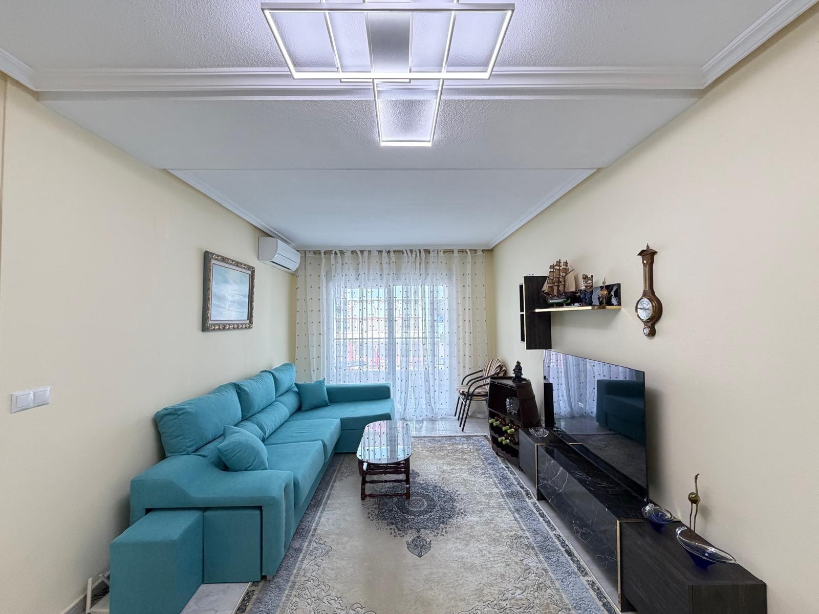 Air conditioning unit mounted in living room, Playa del Cura apartment