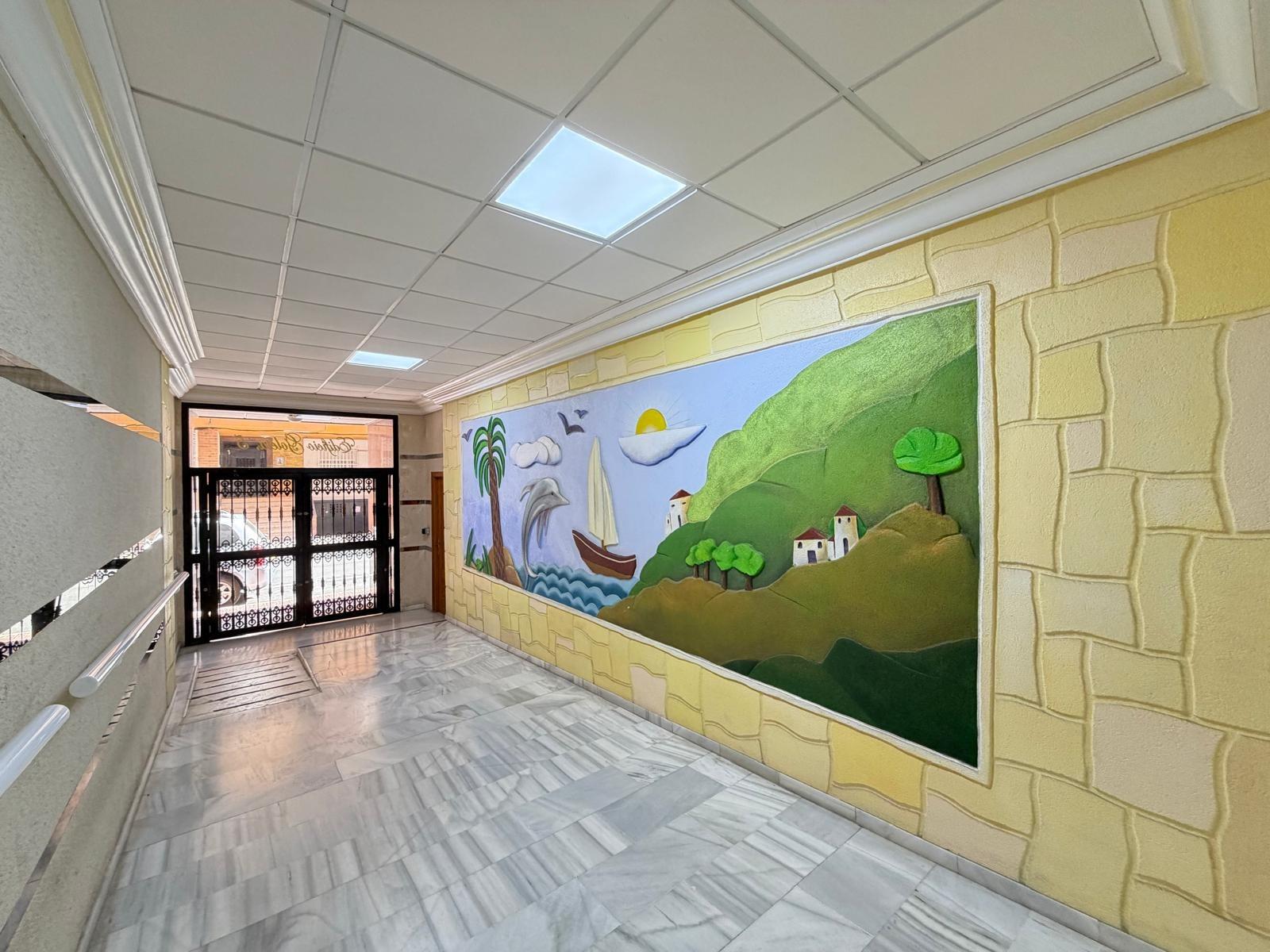 Communal lift doors in residential building, Playa del Cura