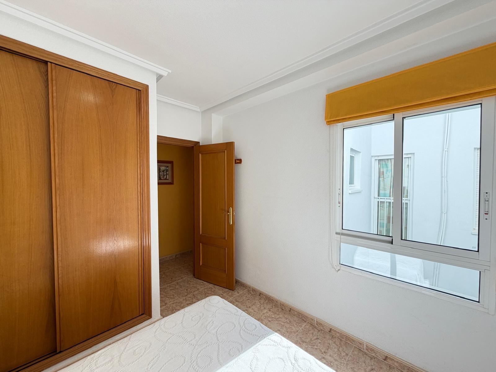 Built-in wardrobes in main bedroom, 2-bedroom penthouse Playa del Cura