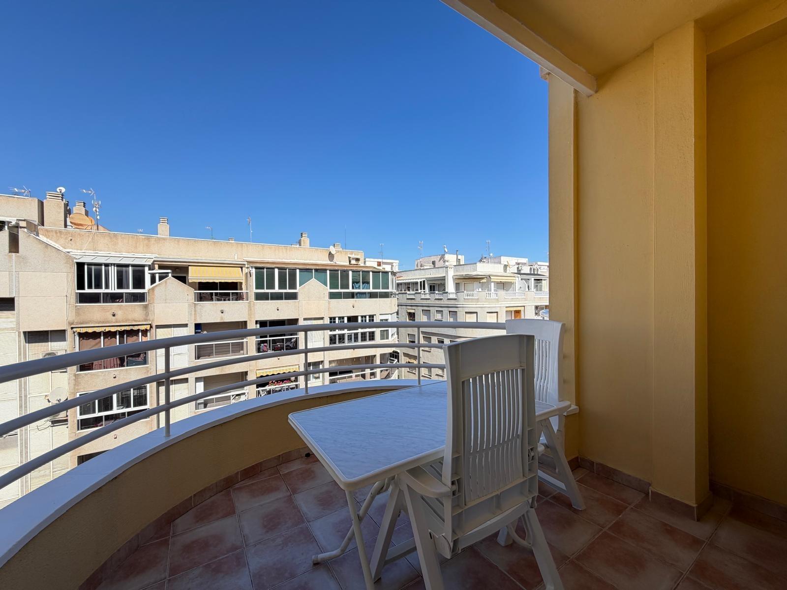 Balcony doors open onto 5m2 terrace, 5th-floor penthouse Playa del Cura
