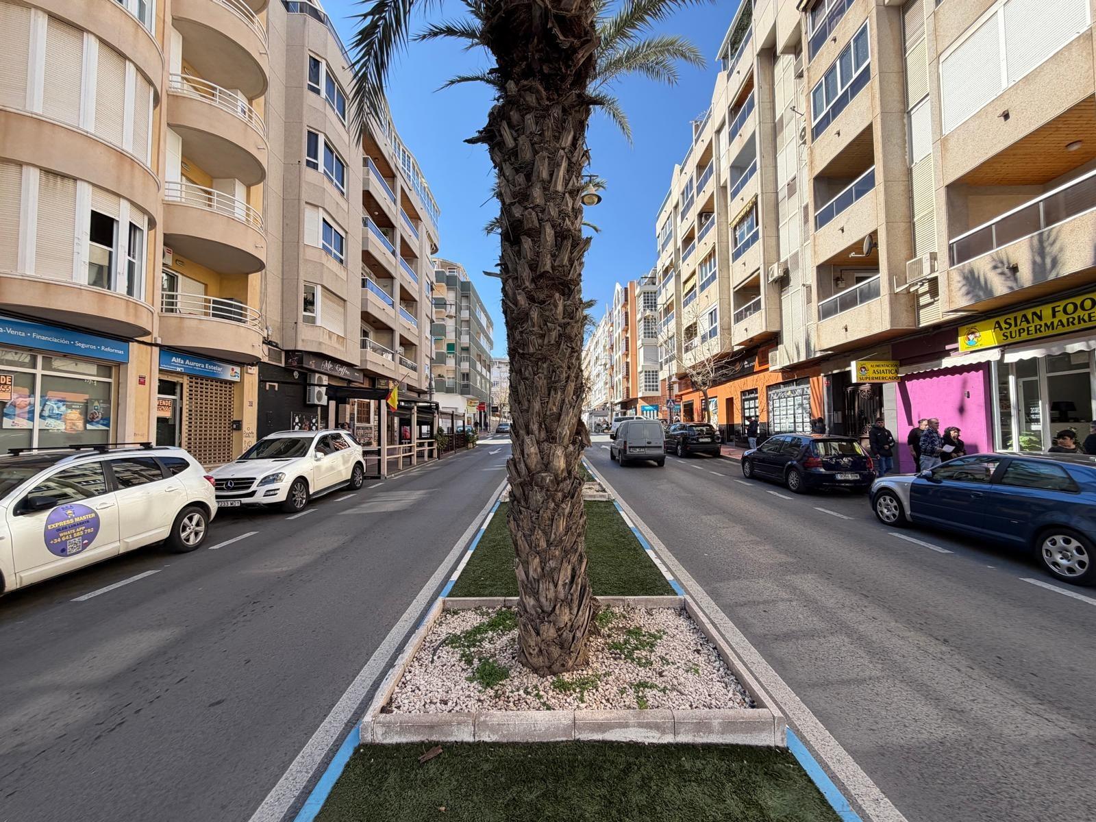 Corridor to apartment on 5th floor, gated building Playa del Cura
