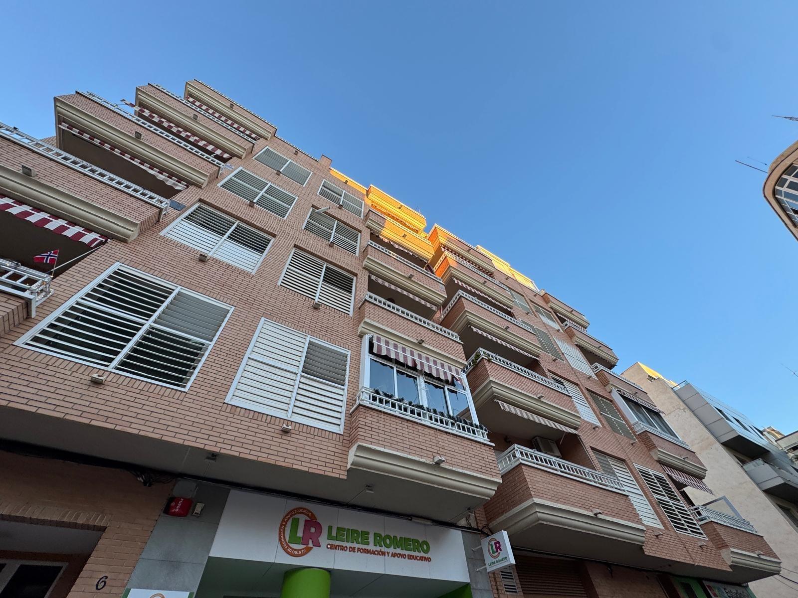 Parking area at ground level near building, Torrevieja Centre