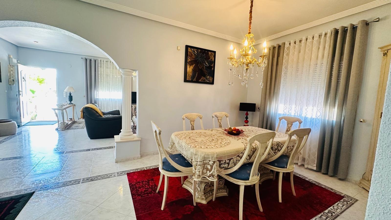 Balcony with outdoor seating in a 3-bedroom villa in Los Balcones, Torrevieja