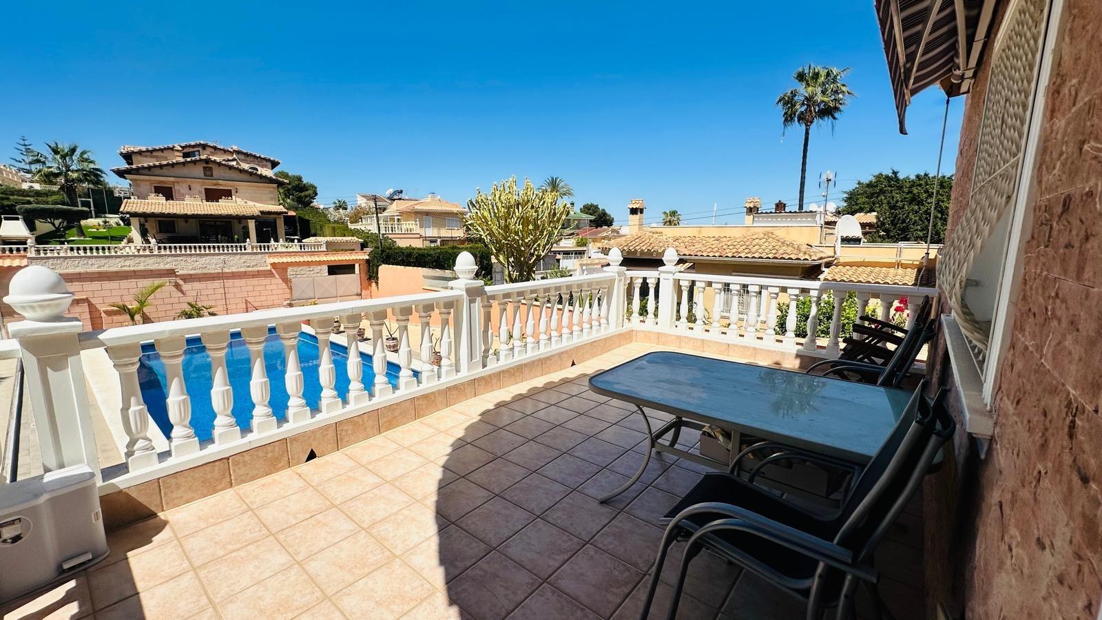 Street-facing exterior of the detached villa in Los Balcones, Torrevieja