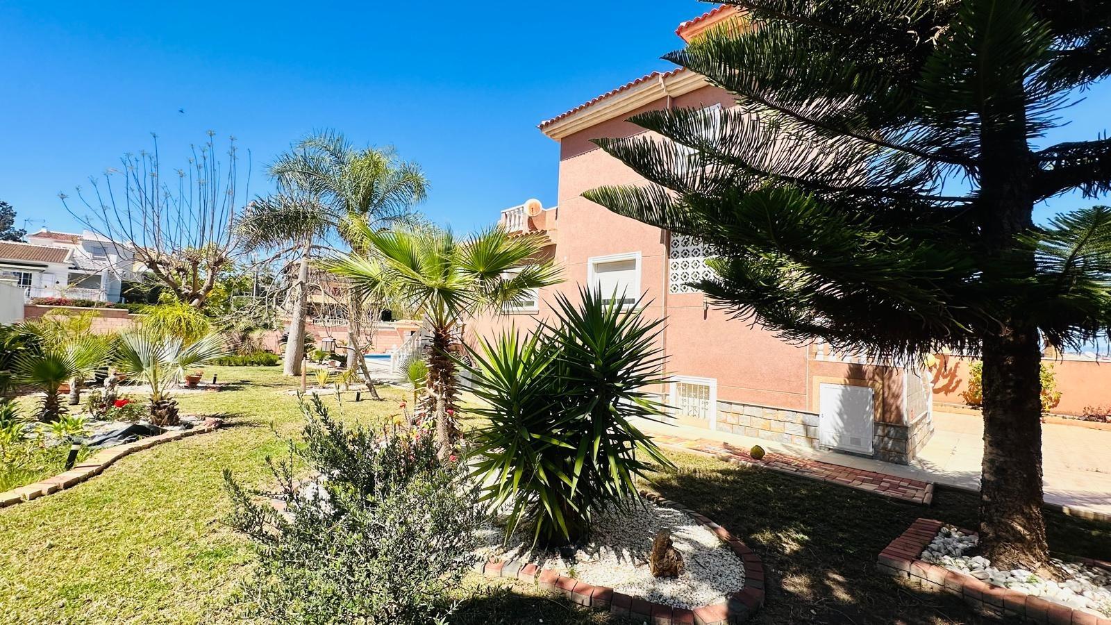 Private pool viewed from the terrace of a 3-bedroom villa in Los Balcones, Torrevieja