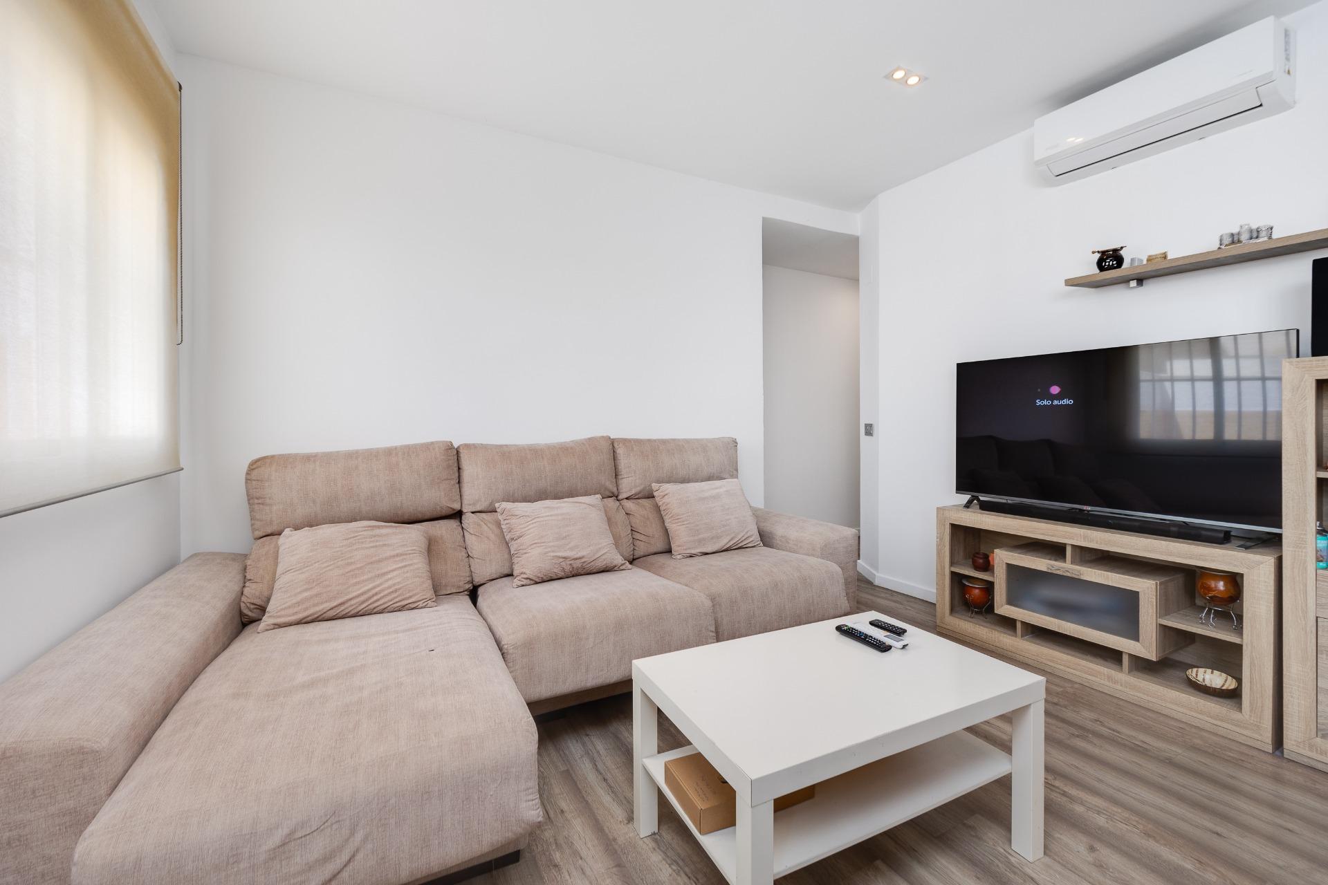 Communal pool and surrounding paved terrace, apartment complex, Playa de los Locos, Torrevieja
