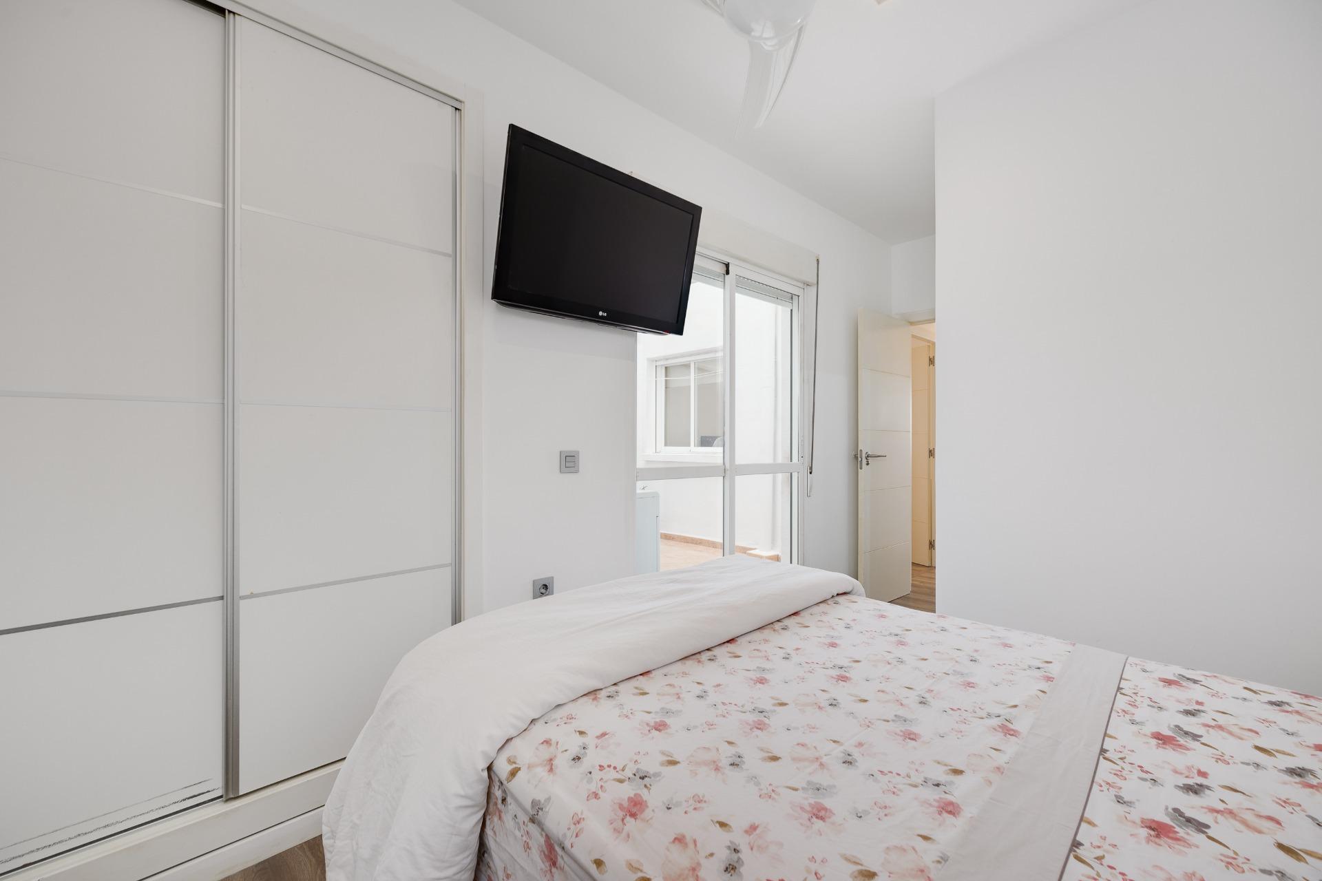 Living room window admitting natural light, ground-floor apartment, Playa de los Locos, Torrevieja