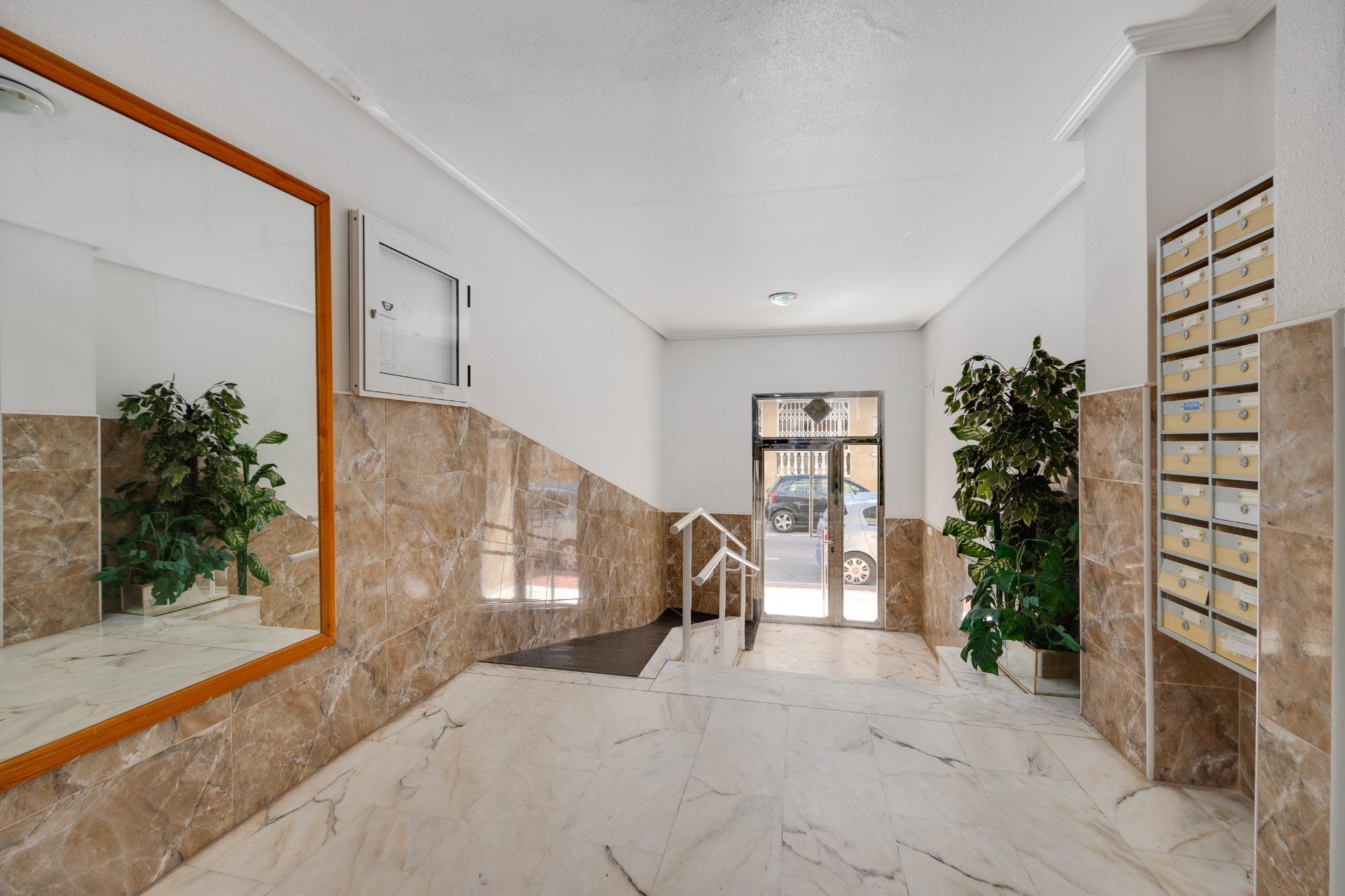 Air conditioning unit on living room wall, ground-floor apartment, Playa de los Locos, Torrevieja
