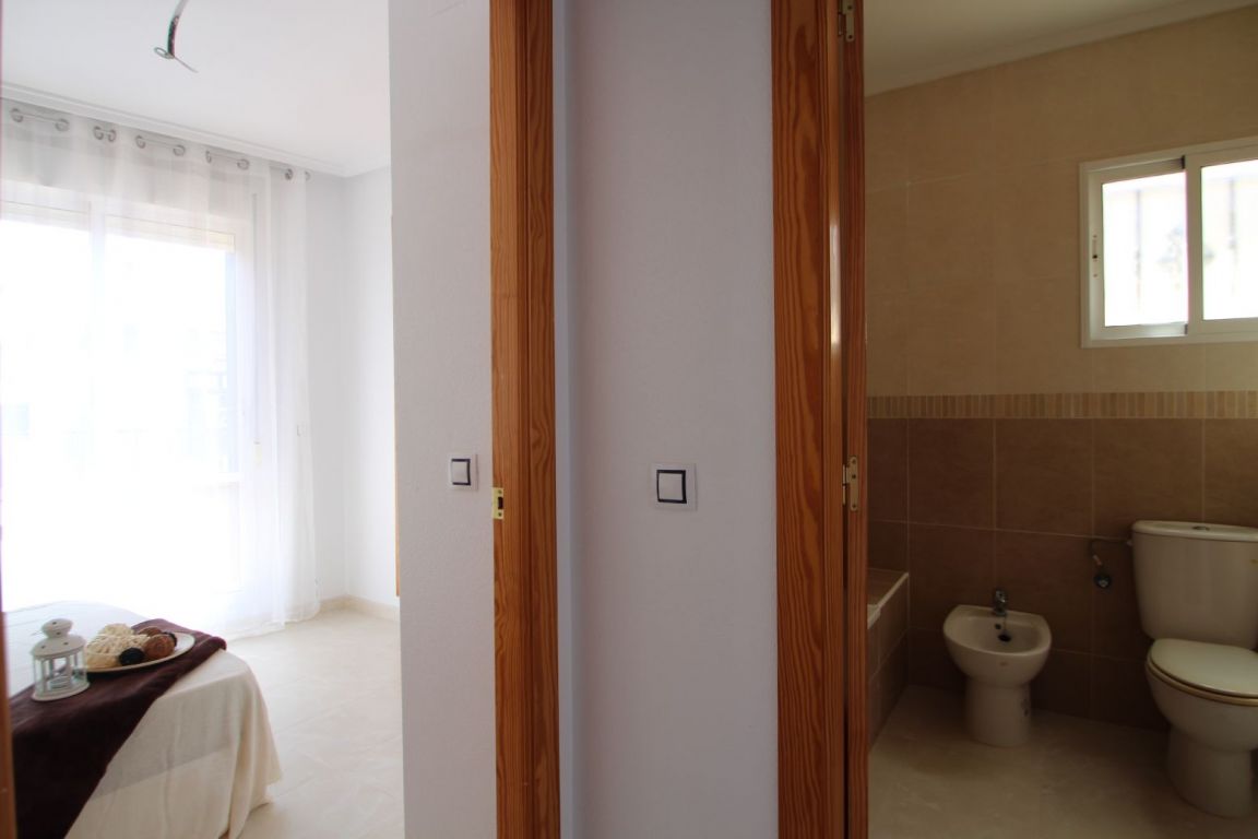 Kitchen worktop with appliances in place, townhouse Aguas Nuevas 1, Torrevieja
