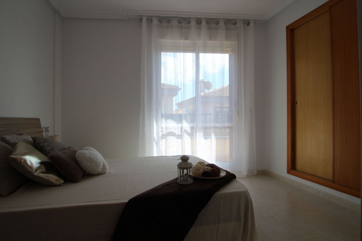 Upper-floor bedroom with east-facing window, townhouse Aguas Nuevas 1, Torrevieja