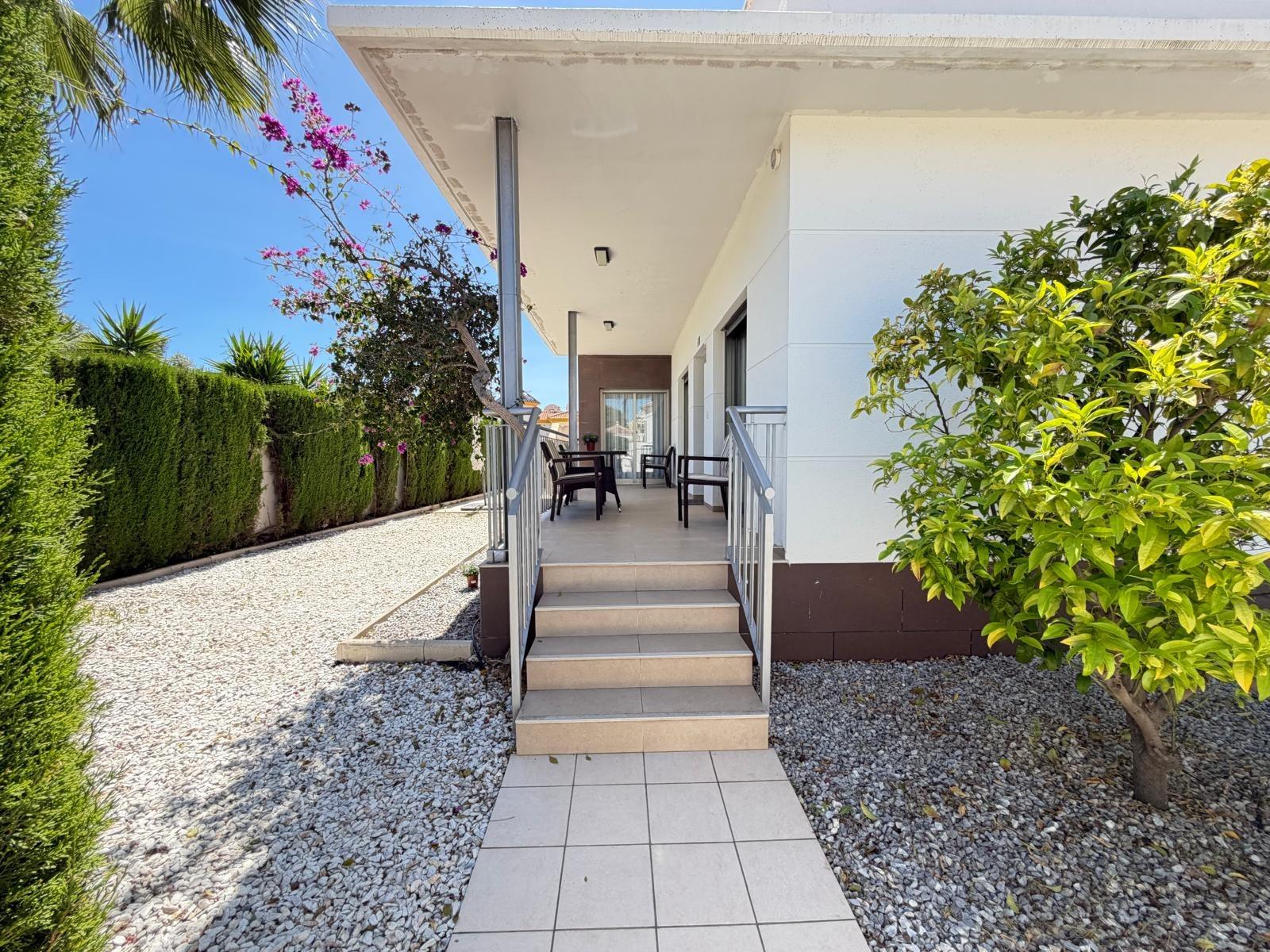 Living room with tiled floor and furnished seating area, 4-bedroom villa, Doña Pepa