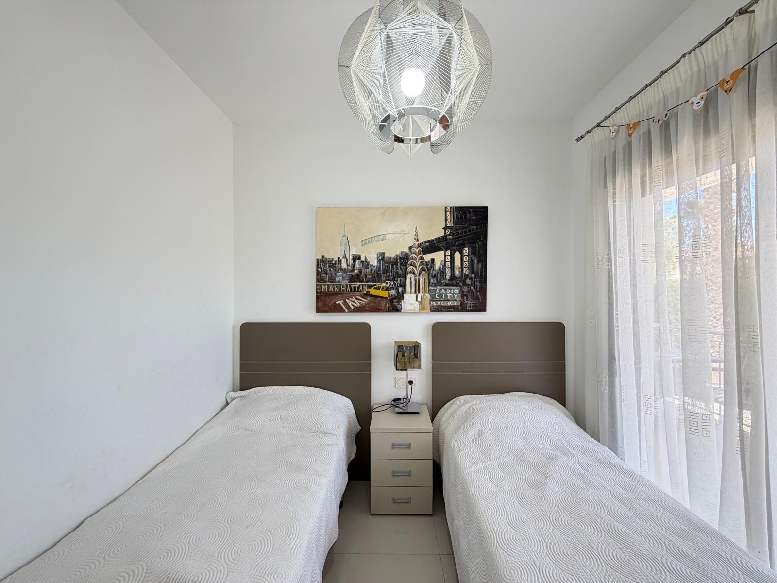 Fitted wardrobe interior detail, bedroom in villa, Doña Pepa