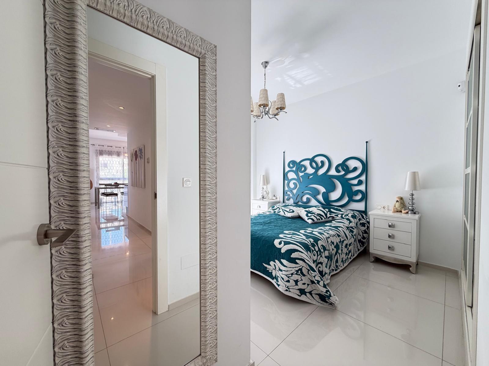Open-plan living and dining area viewed from kitchen side, Doña Pepa