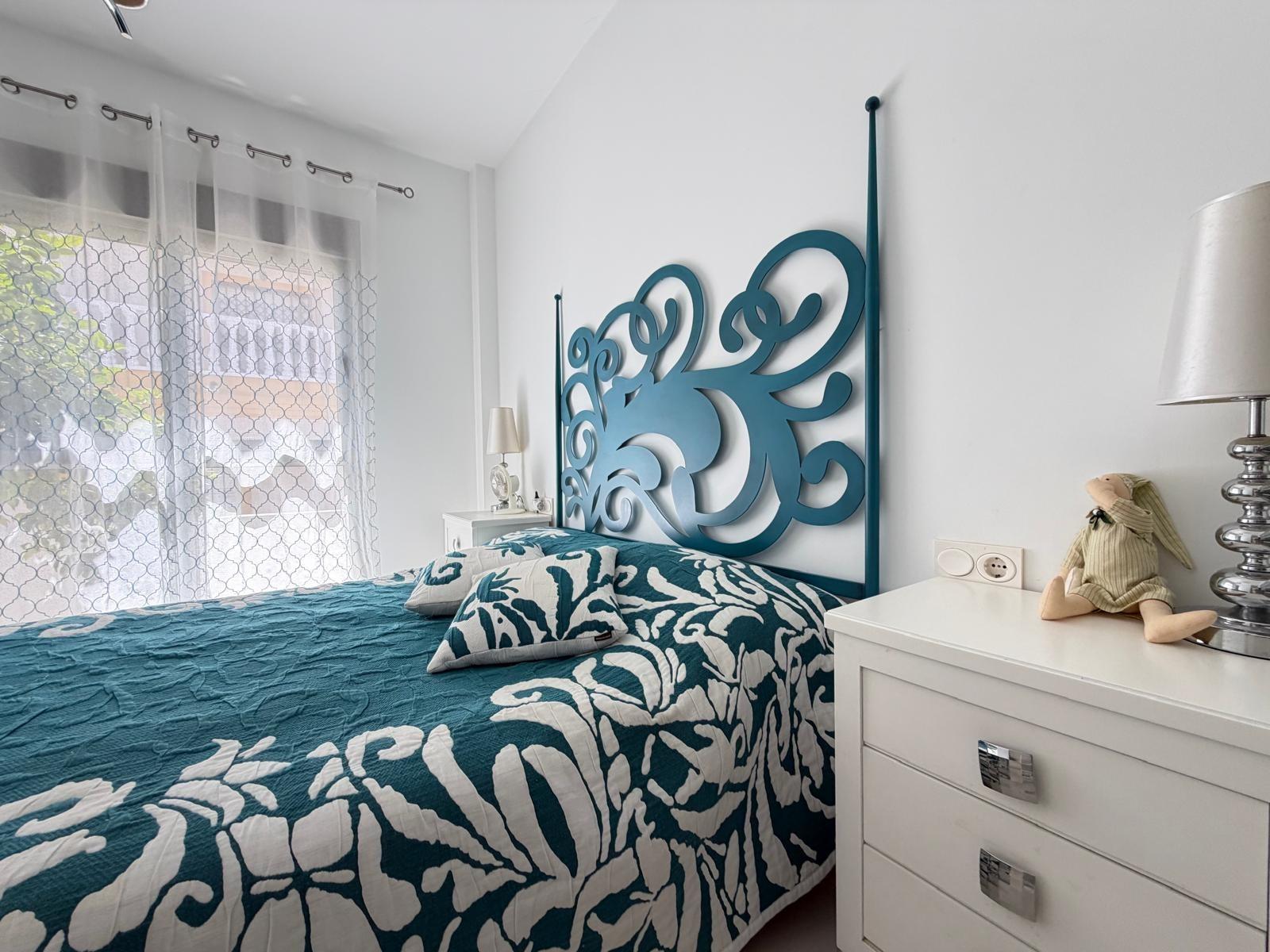 Bedroom with double bed and side tables, Doña Pepa villa