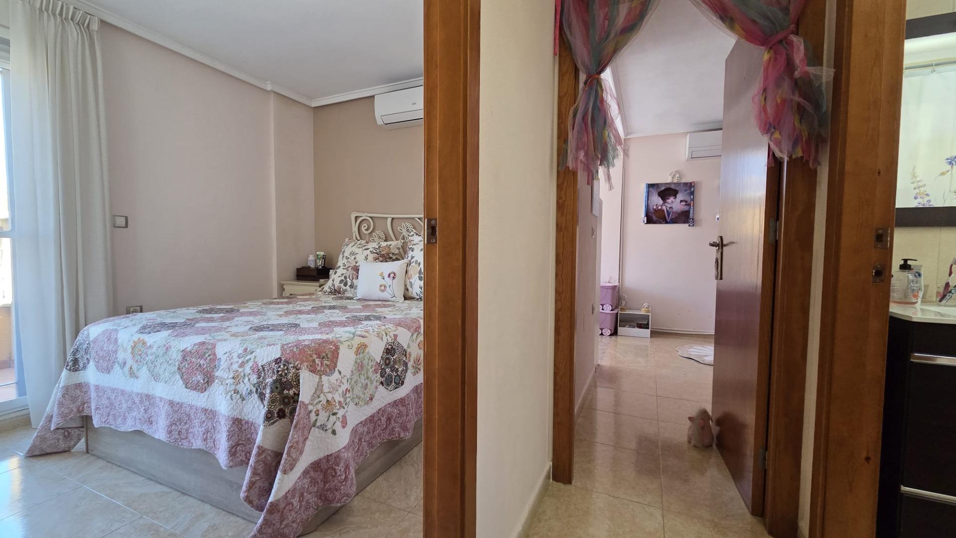 Street-facing exterior of corner townhouse, Aguas Nuevas, Torrevieja