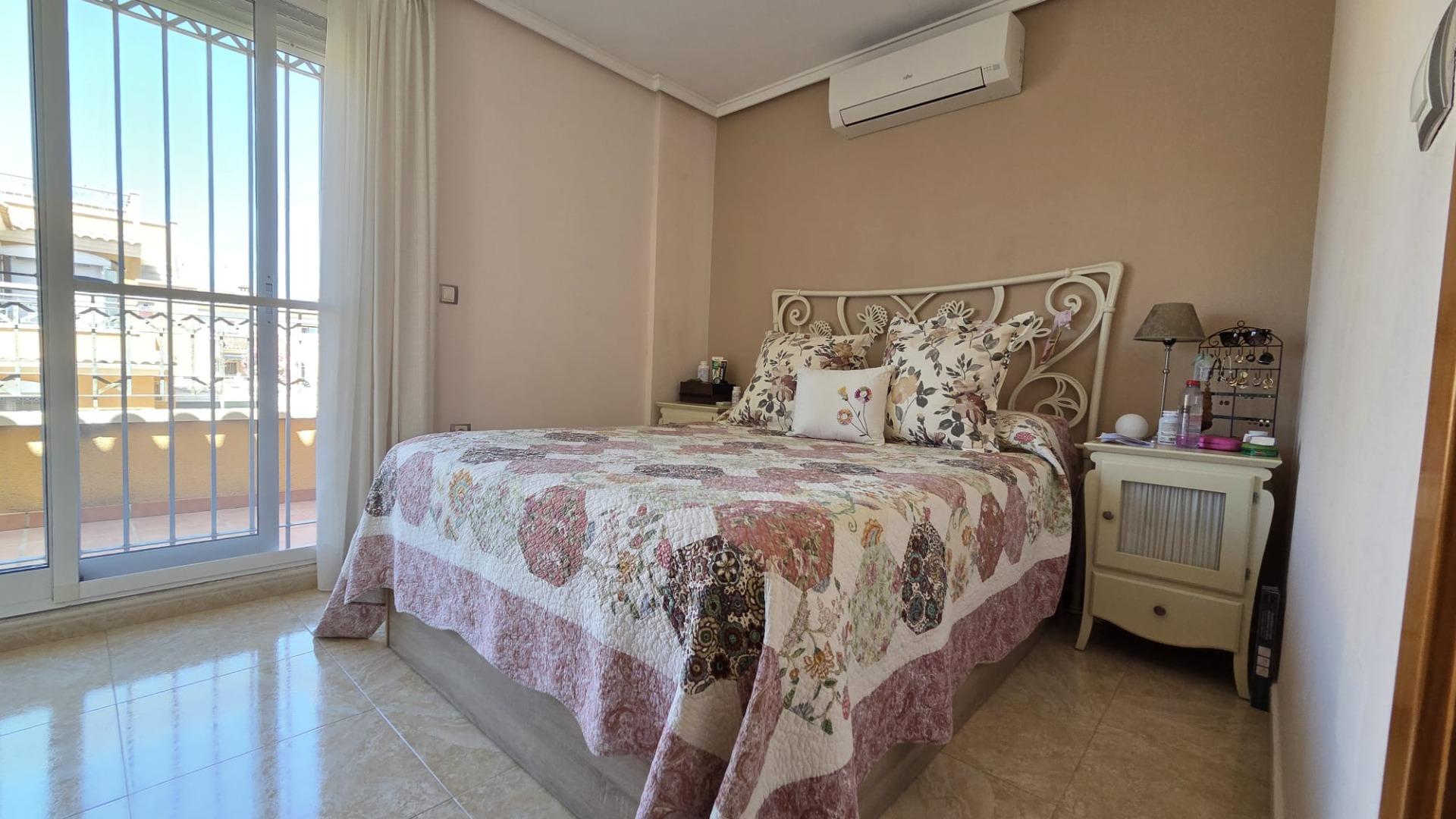 Side elevation of corner townhouse showing plot boundary, Aguas Nuevas, Torrevieja