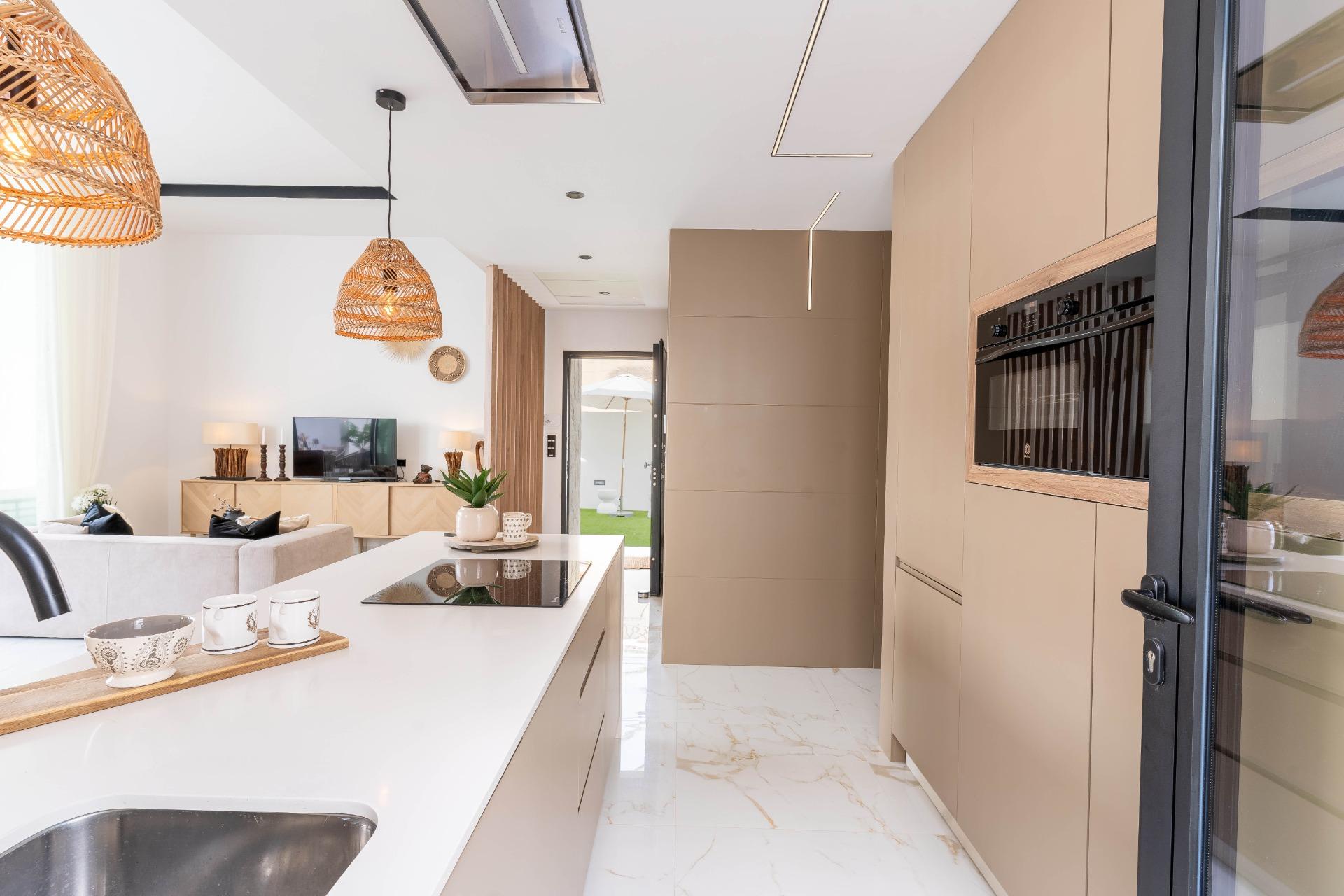 Kitchen cabinetry and countertop in handleless finish, La Siesta villa