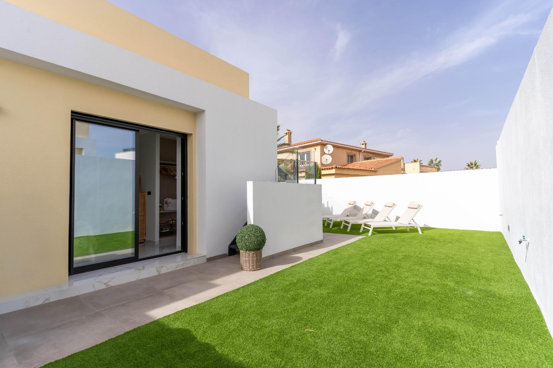 Open-plan living area showing ceiling height and glazing, La Siesta villa