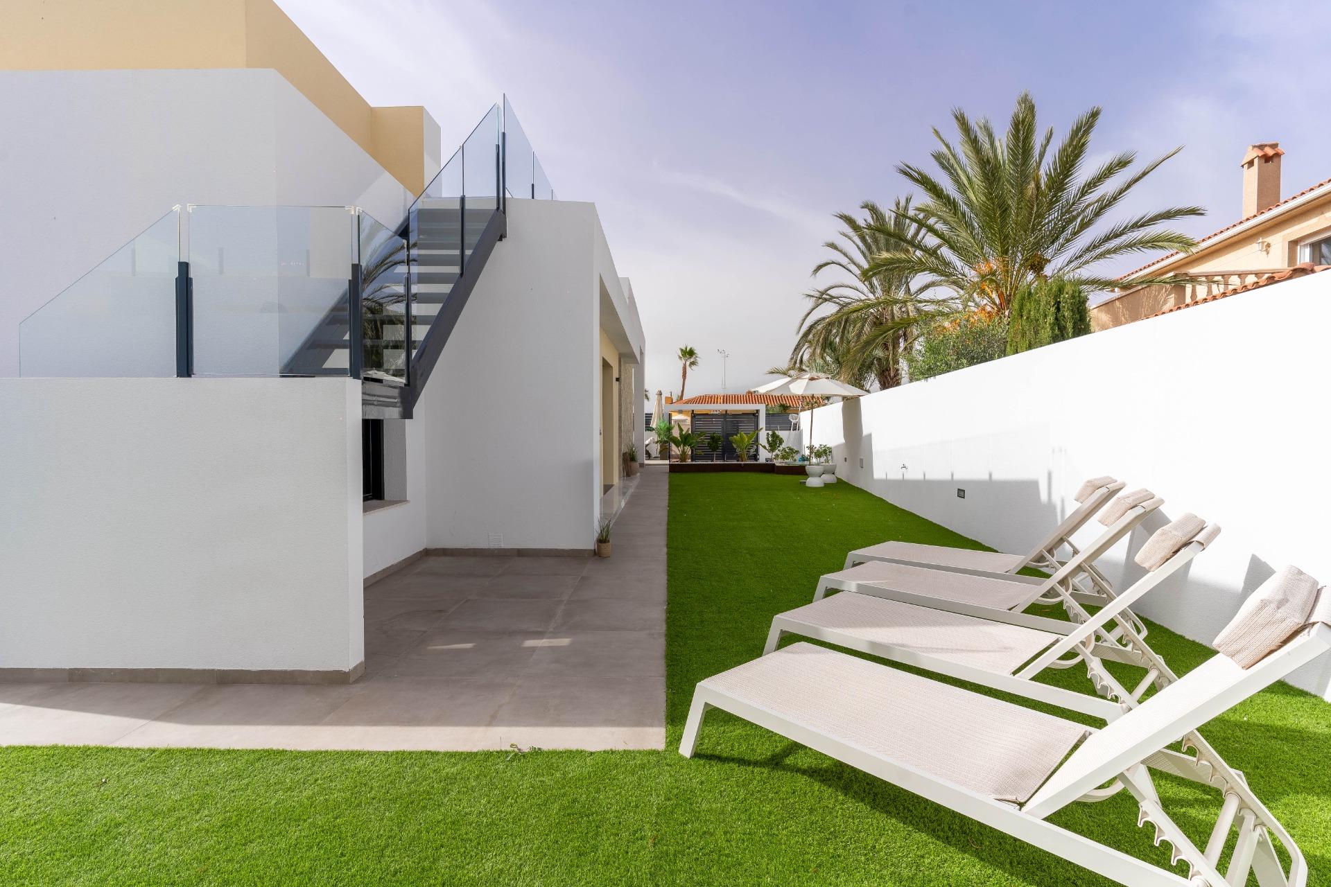Pool water surface and surrounding deck tiles, La Siesta villa