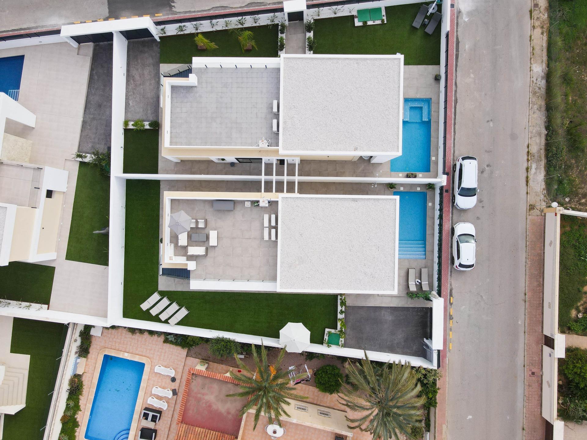 Overview of rear garden and pool area from terrace, La Siesta villa