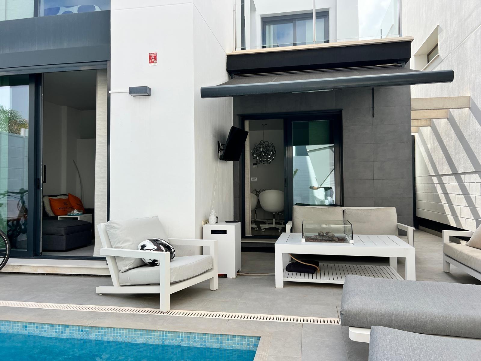 Pool area with sun terrace, villa in Villamartín-Las Filipinas, Orihuela Costa