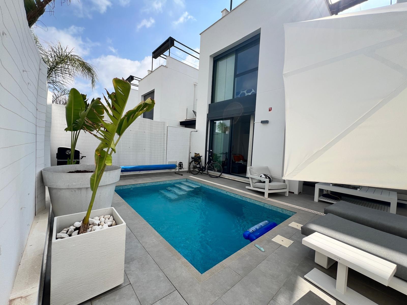 Pool and chill-out zone at dusk, villa in Villamartín-Las Filipinas