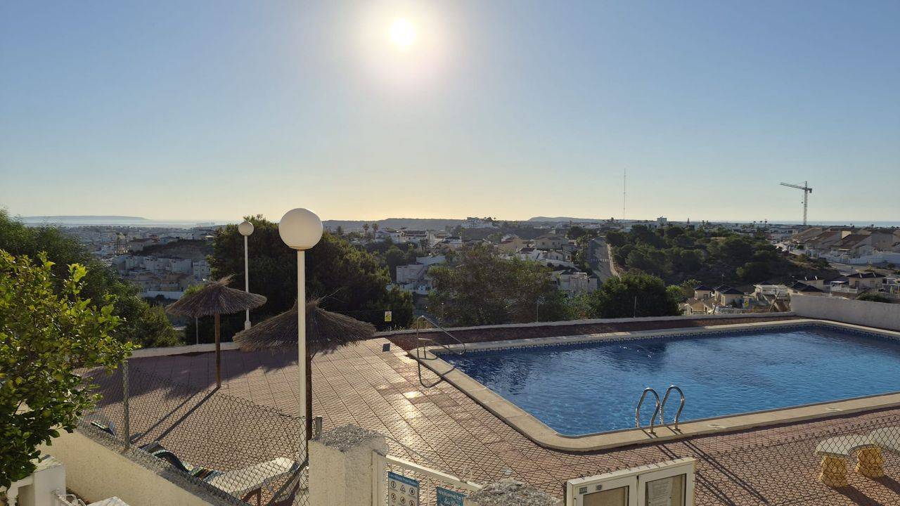 Living area with window in 1-bedroom apartment, Rojales Hills