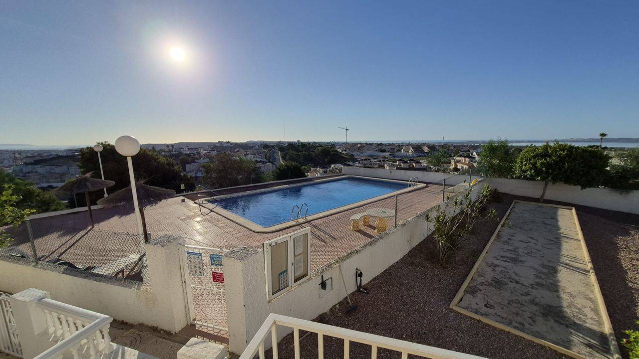 Bedroom interior with natural light in 1-bedroom apartment, Rojales Hills