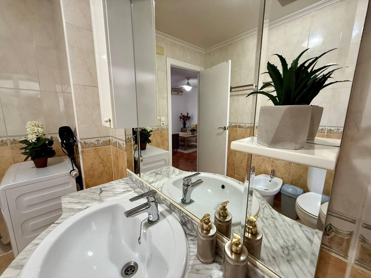 Bathroom basin and wall tiling detail, 2-bedroom apartment, Playa del Cura