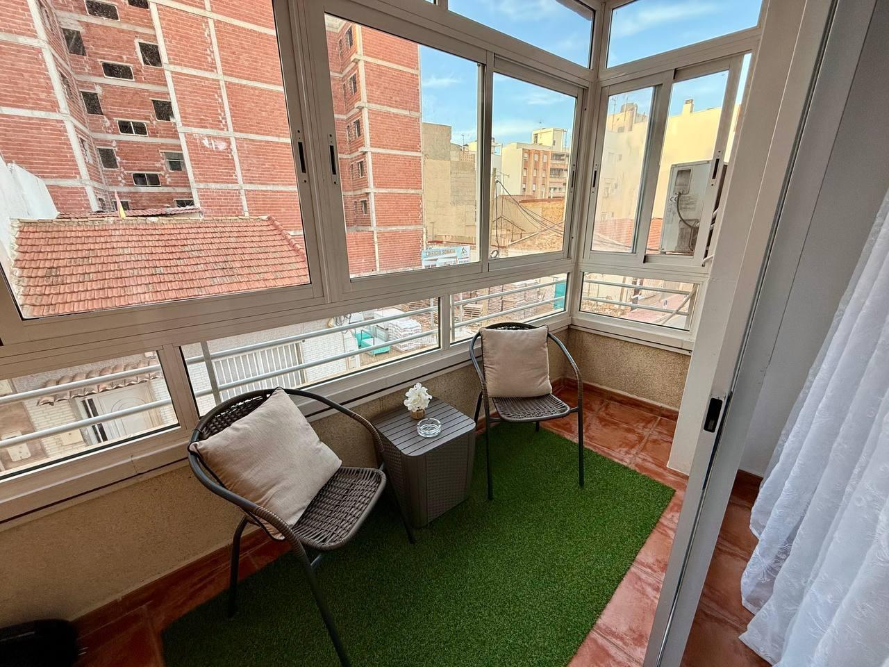 Tiled flooring in living and dining room, Playa del Cura apartment