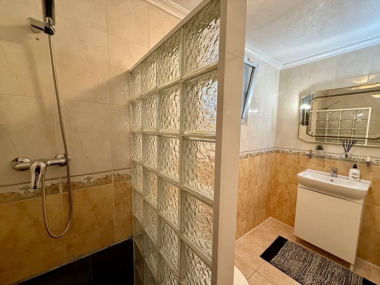 Exterior stairwell and lift doors in residential building, Playa del Cura