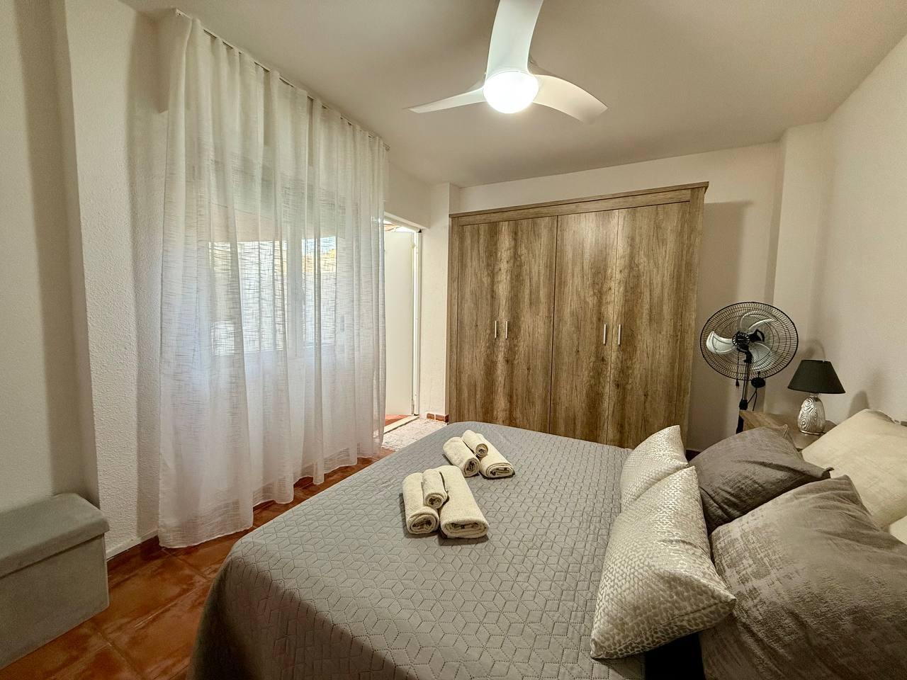 Ground-floor communal hallway in apartment building, Playa del Cura
