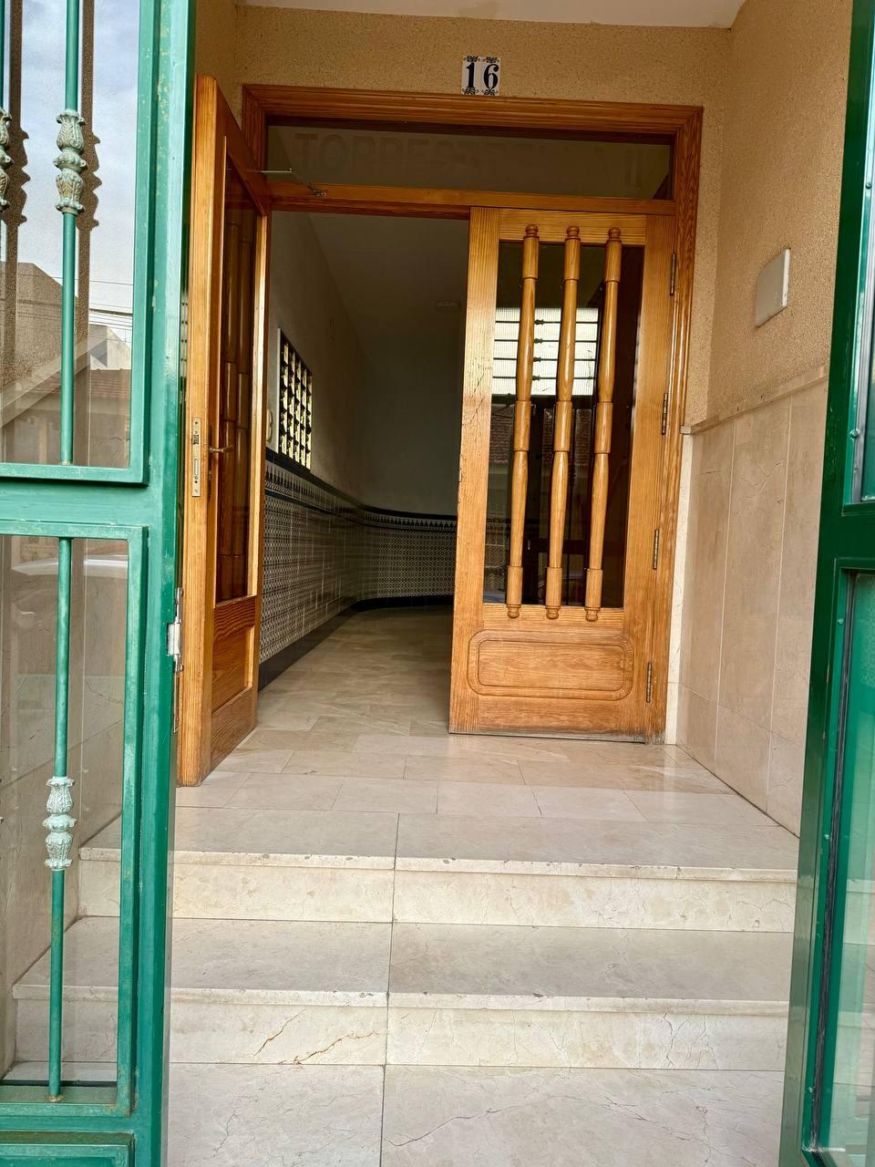 External view of first-floor apartment windows from street, Playa del Cura, Torrevieja