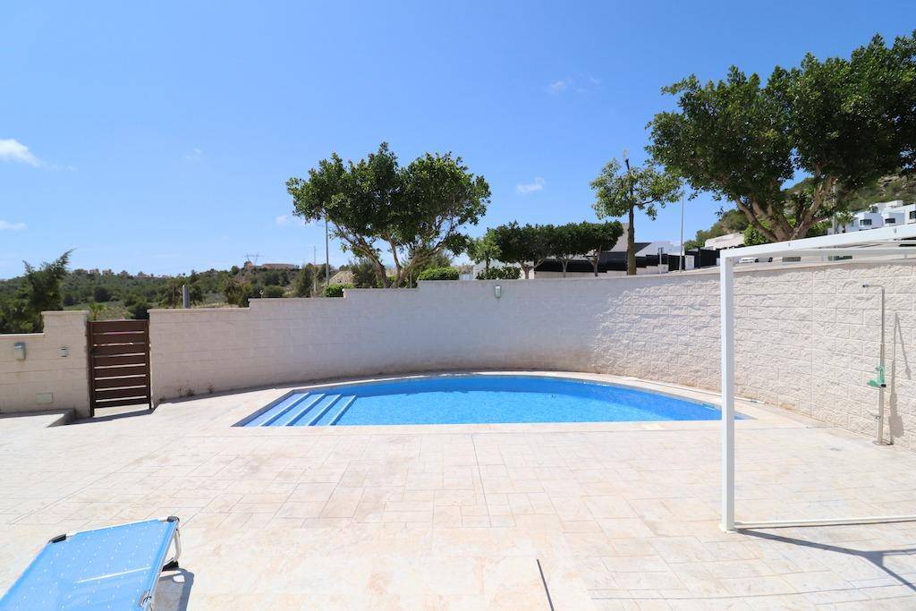 View from terrace over Bellavista rooftops and salt lake park, San Miguel De Salinas