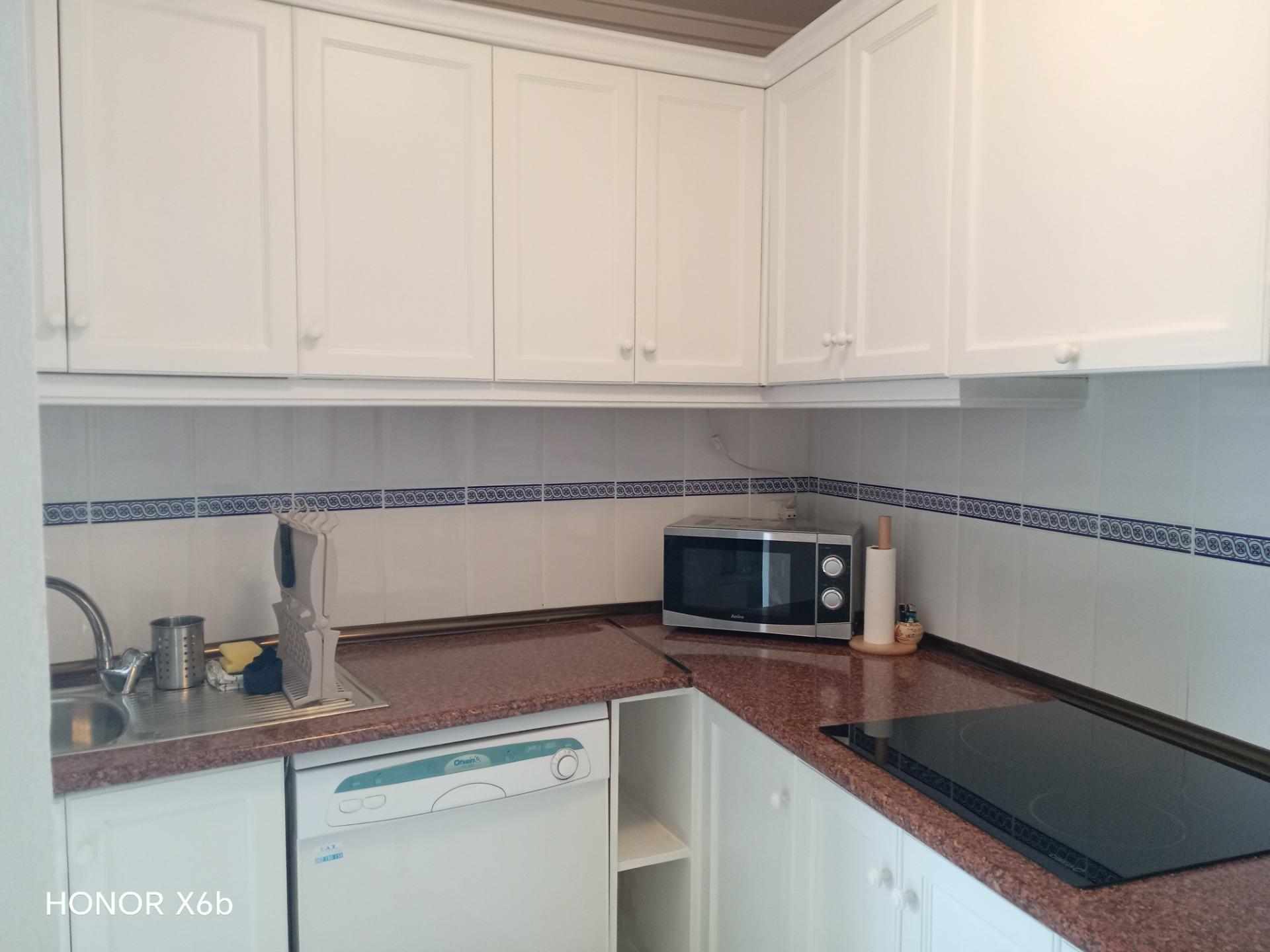 Dining area adjoining living room in 2-bedroom penthouse, Acequion, Torrevieja
