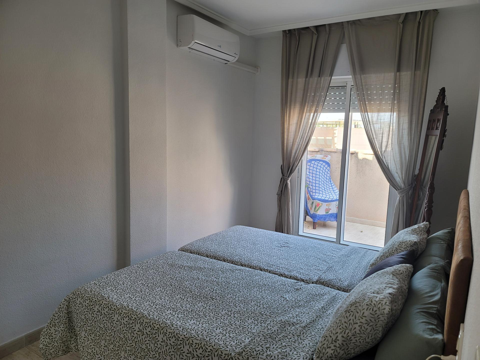 Kitchen worktop and overhead storage detail, penthouse, Acequion, Torrevieja