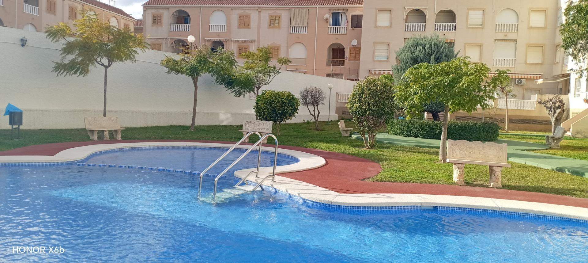 Terrace flooring and metal railing detail, top-floor penthouse, Acequion, Torrevieja